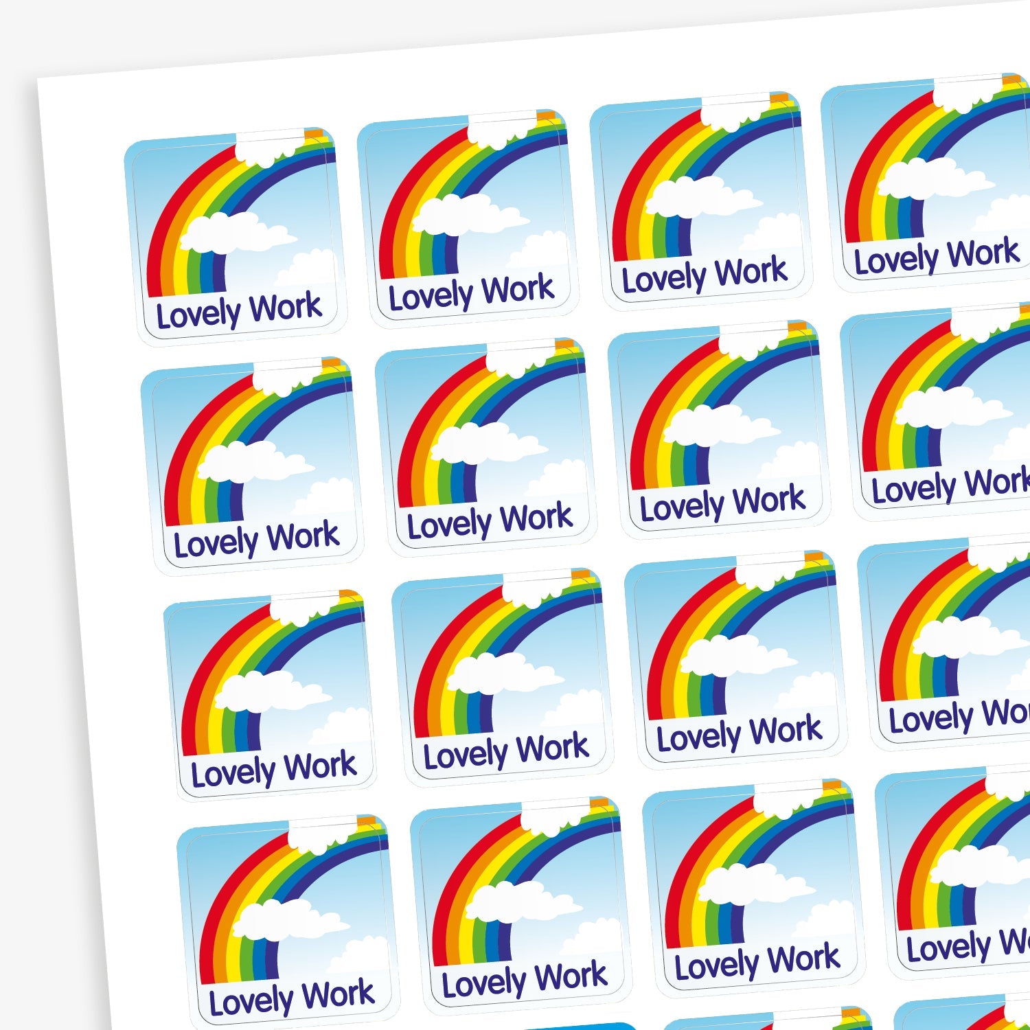 A sheet of 140 square 16mm reward stickers, each featuring the phrase 'Lovely Work' in bold text, set against a sky background with a vibrant coloured rainbow.