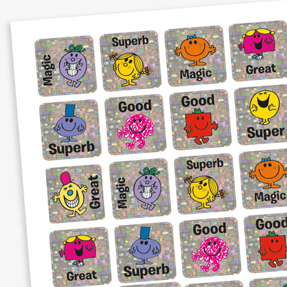 A sheet of 140 holographic silver square stickers.  20mm in size each with different Mr Men or Little Miss characters, such as Mr Strong, Mr Tickle, Little Miss Sunshine and Little Miss Giggles. Text around the character inclues 'Magic', 'Superb', 'Good' and 'Great'.