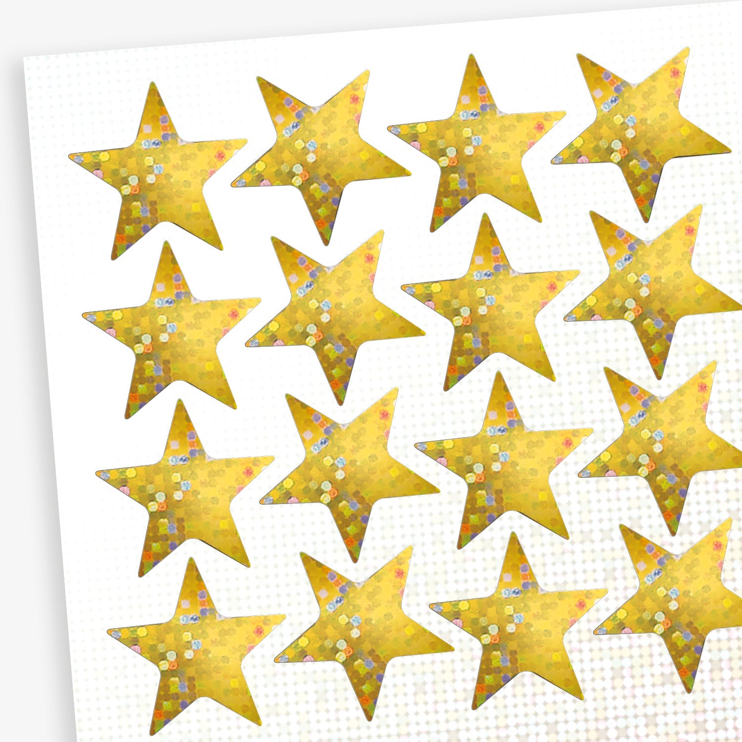A sheet of holographic, gold star shaped stickers
