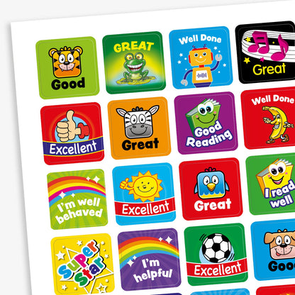 A sheet displaying 140 assorted 16mm square reward stickers in various bright colours, featuring motivational phrases such as 'Excellent', 'Well Done', and 'Great', alongside cheerful cartoon characters like animals and smiley faces.
