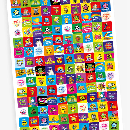 An overview of a sheet displaying 140 assorted 16mm square reward stickers in various bright colours, featuring motivational phrases such as 'Excellent', 'Well Done', and 'Great', alongside cheerful cartoon characters like animals and smiley faces.