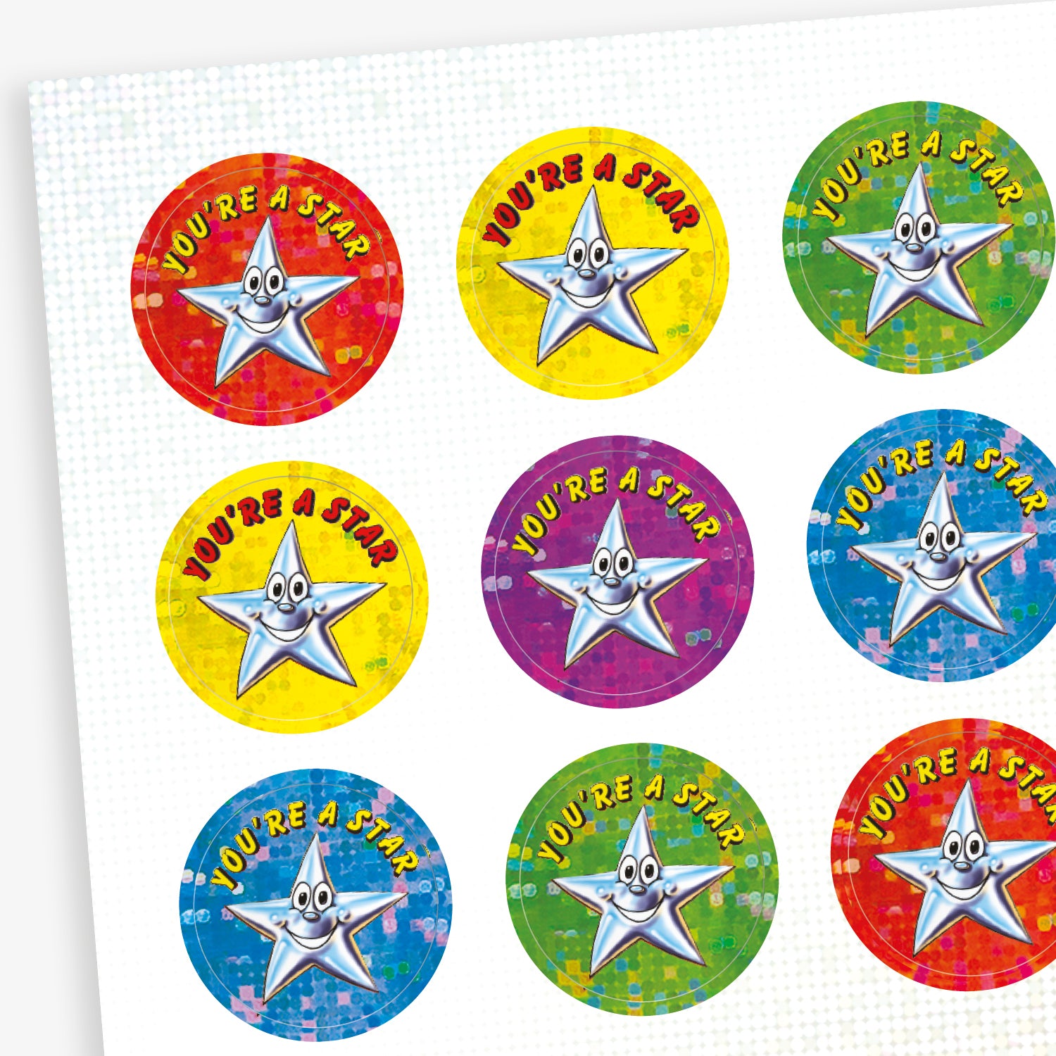 Sheet of 20mm round holographic stickers featuring a smiling silver star character with the text 'You're a Star' in bold, colourful letters on vibrant red, yellow, green, blue, and purple backgrounds.