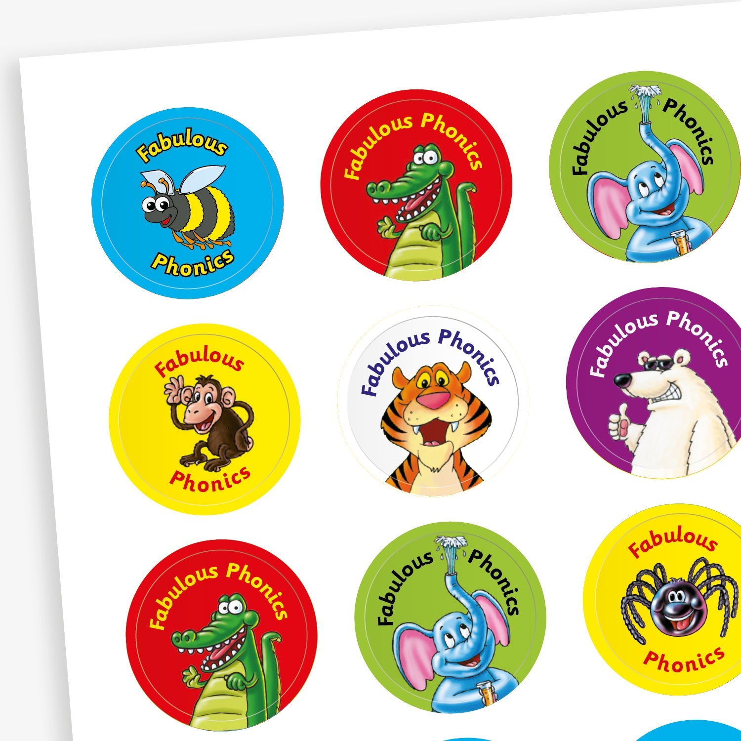 A sheet of circular stickers each with the phrase 'Fabulous Phonics'against various bright coloured backgrounds and images including: a bee, crocodile, elephant, spider, monkey, polar bear and a tiger.