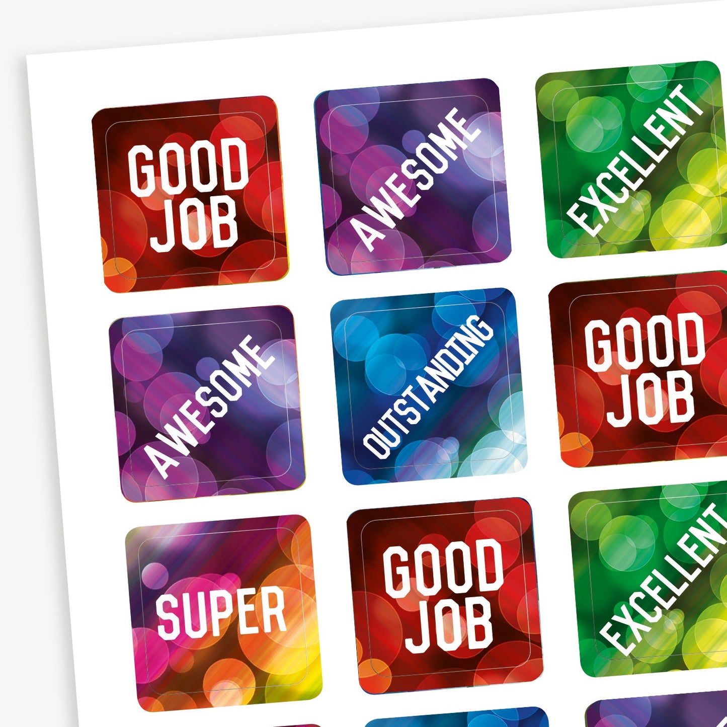 A sheet of square reward stickers with phrases including 'Good Job', 'Awesome', 'Excellent', 'Outstanding' and 'Super'.  The backgrounds are akin to lights through a rainy window and coloured red, purple, green and blue.