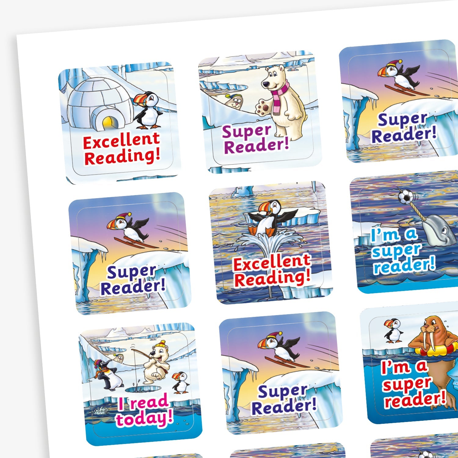 A sheet of square reward stickers with phrases including 'Super Reader!', 'Excellent Reading!' and 'I read today!' in blue, purple or red text. Each sticker features arctic-themed cartoon animals such as puffins, polar bears, and walruses, engaging in playful activities against icy, snowy backdrops. 