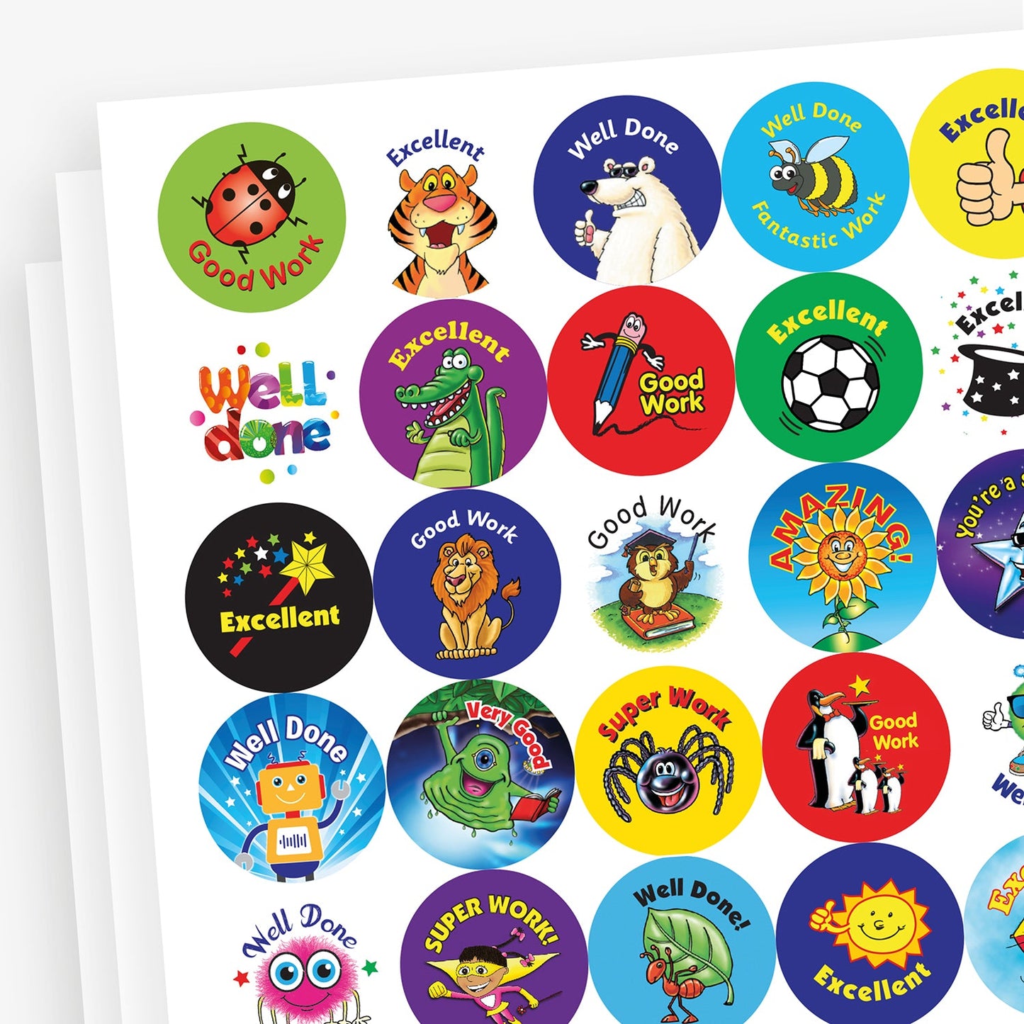 A value pack of 1,050 round 25mm reward stickers featuring a diverse assortment of colourful designs and motivational phrases such as 'Well Done', 'Excellent', and 'Super Work'; designed to celebrate and encourage pupils' achievements in educational settings.