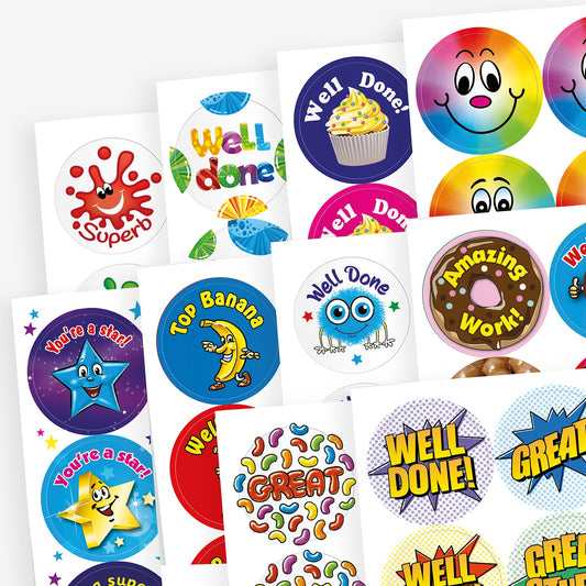 A collection of 32mm circular stickers in various vibrant designs, including smiling faces, stars, cupcakes, and comic-style text, each emitting different scents such as berry, chocolate, vanilla, and bubblegum when rubbed.
