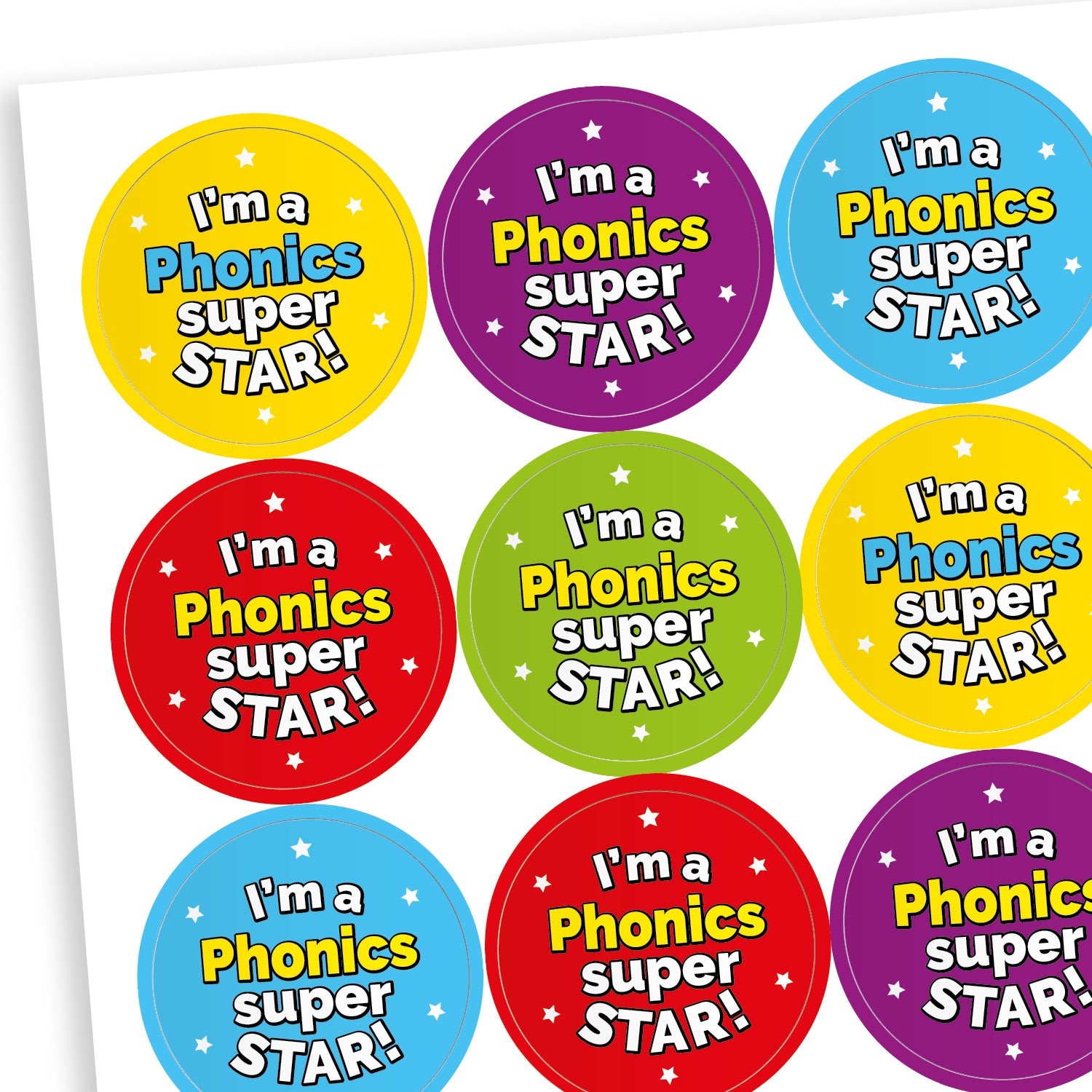 A sheet of round reward stickers with the phrase 'I'm a Phonics super STAR!' in bold white and yellow text. The stickers have starry backgrounds in various bright colours including blue, red, green, purple, and turquoise, creating a cheerful and encouraging appearance.