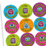 A sheet of shiny, holographic circular stickers featuring colourful cartoon monsters and growth mindset messages. The stickers include phrases such as: 'I have a Growth Mindset', 'I am resilient', 'I learn from my mistakes', 'Effort makes my brain grow', and 'I can do it now!'. Each sticker has a glittery background in vibrant colours like blue, green, pink, orange, and purple.