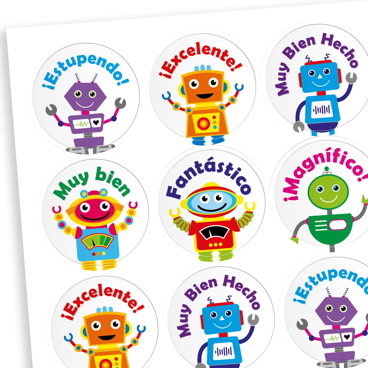 A sheet of circular reward stickers featuring cheerful cartoon robots and Spanish praise words. Phrases include '¡Estupendo!', '¡Excelente!', 'Muy Bien Hecho', 'Muy bien', 'Fantástico', and '¡Magnífico!'. Each sticker has a white background and brightly coloured robots in purple, orange, blue, green, and red, celebrating achievement in a fun and engaging way.