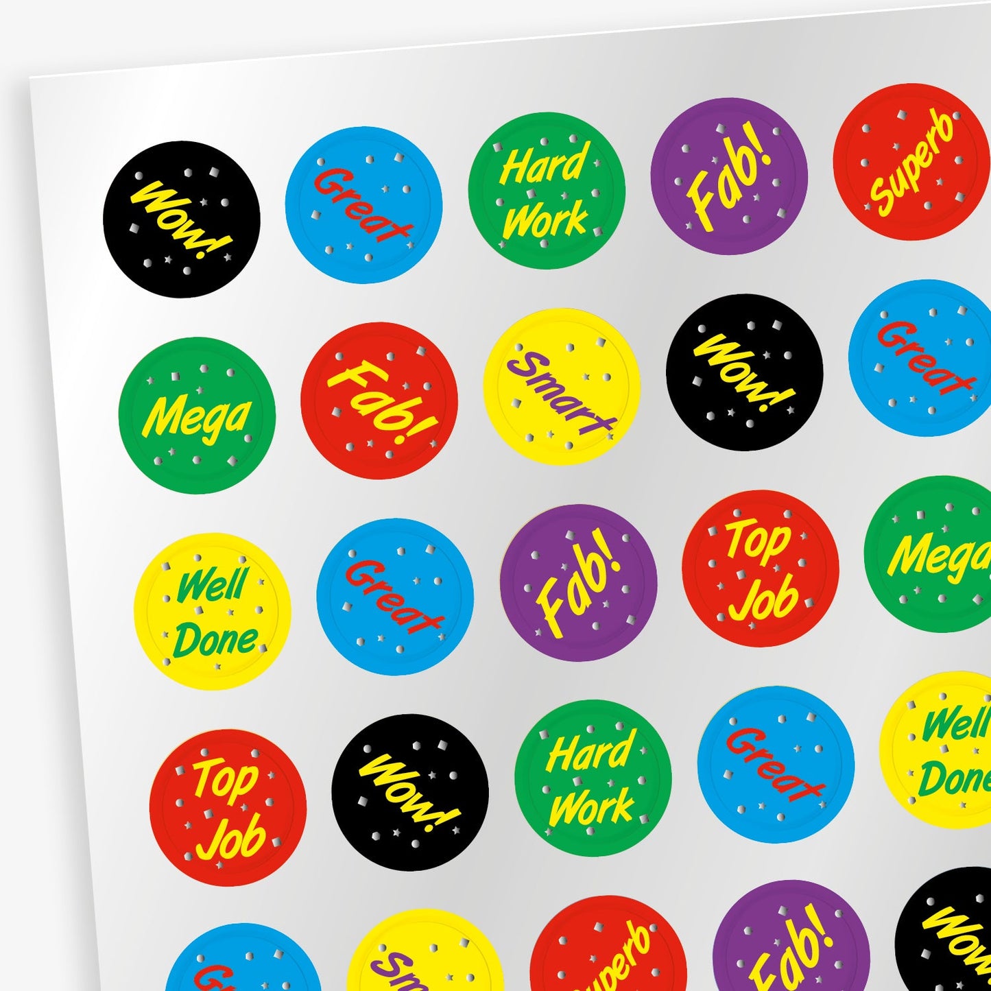 16 Sheets of 196 metallic 10mm circular reward stickers in assorted colours, each featuring phrases such as 'Well Done', 'Great', 'Top Job', and 'Superb' in bold lettering. The stickers have a shiny, reflective finish and are designed to motivate and reward pupils' achievements.