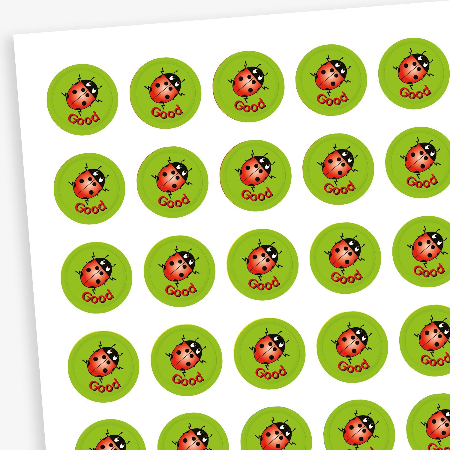 Sheet of 196 assorted 10mm circular reward stickers featuring ladybird on a green background, each sticker has the word 'Good' underneath the ladybird. Each sticker is designed to motivate and reward pupils, suitable for use on charts, books, and clothing.