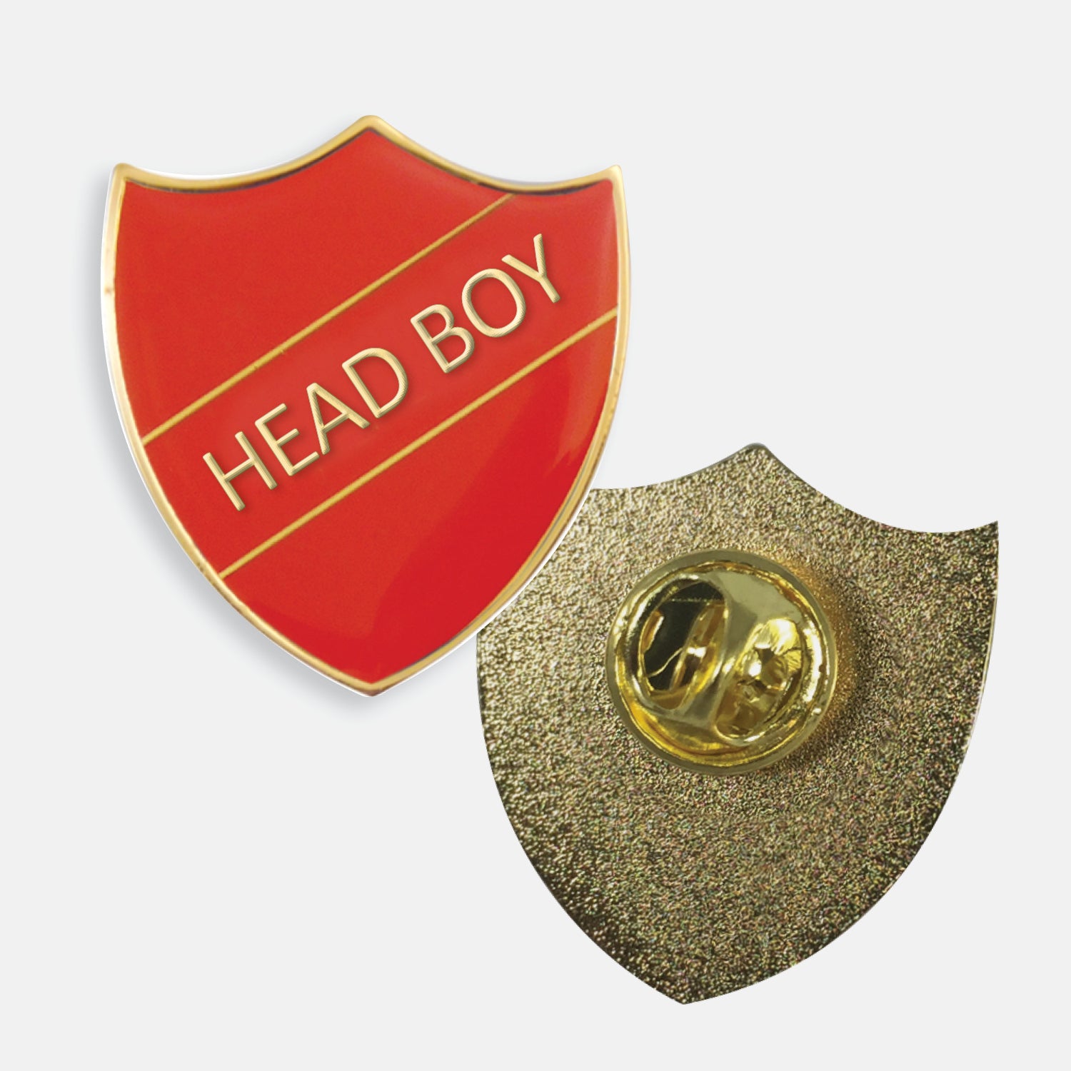 Red enamel badge in the shape of a shield with gold trim and diagonal gold line either side of the words 'HEAD BOY' in capital letters. The reverse side shows a textured gold back with a pin fastening