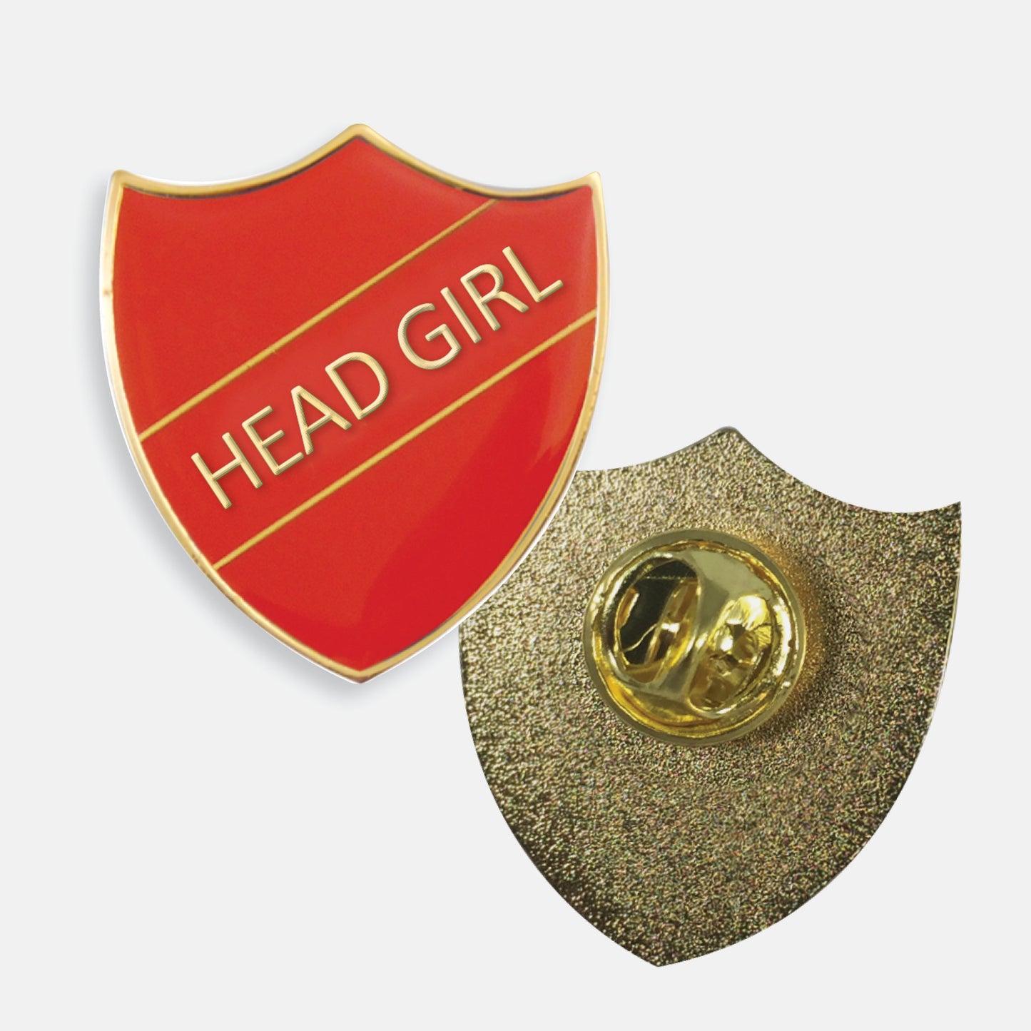 Red enamel badge in the shape of a shield with gold trim and diagonal gold line either side of the words 'HEAD GIRL' in capital letters. The reverse side shows a textured gold back with a pin fastening