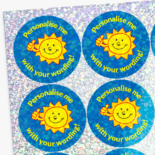 Four round stickers with sun graphics and text on a glittery background