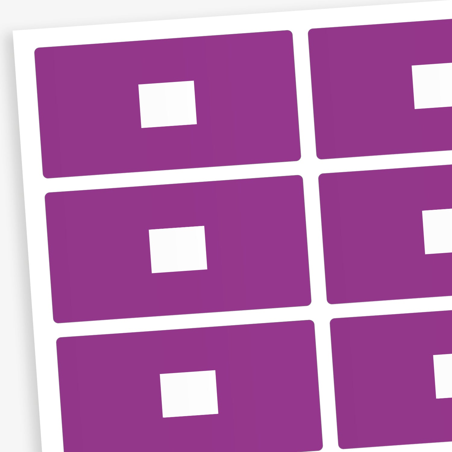 A set of 100 rectangular library labels, each measuring 72mm by 38mm, featuring a bold purple background with a white central panel for handwritten or printed text; designed to assist in categorising and organising books within educational settings