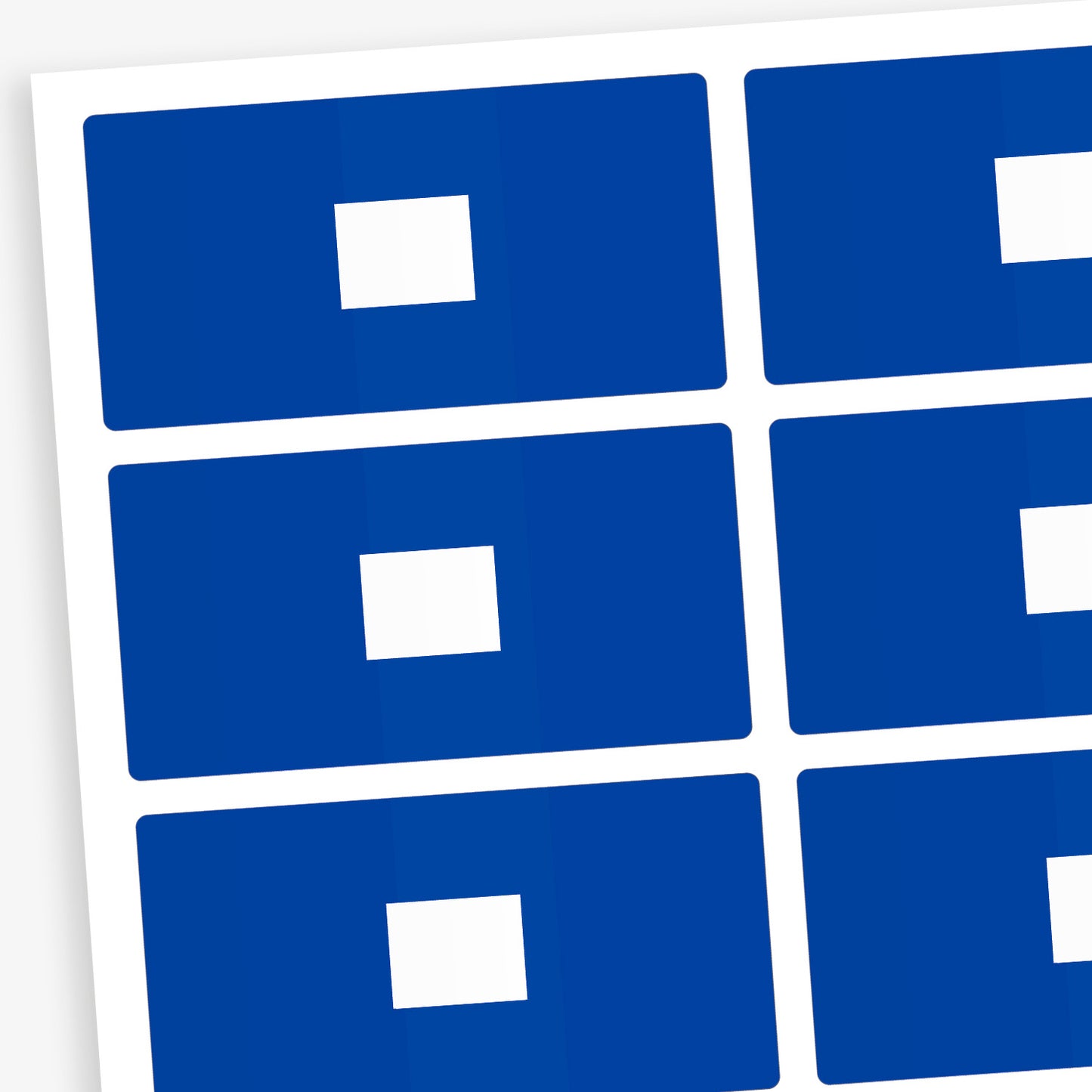 A set of 100 rectangular library labels, each measuring 72mm by 38mm, featuring a bold blue background with a white central panel for handwritten or printed text; designed to assist in categorising and organising books within educational settings