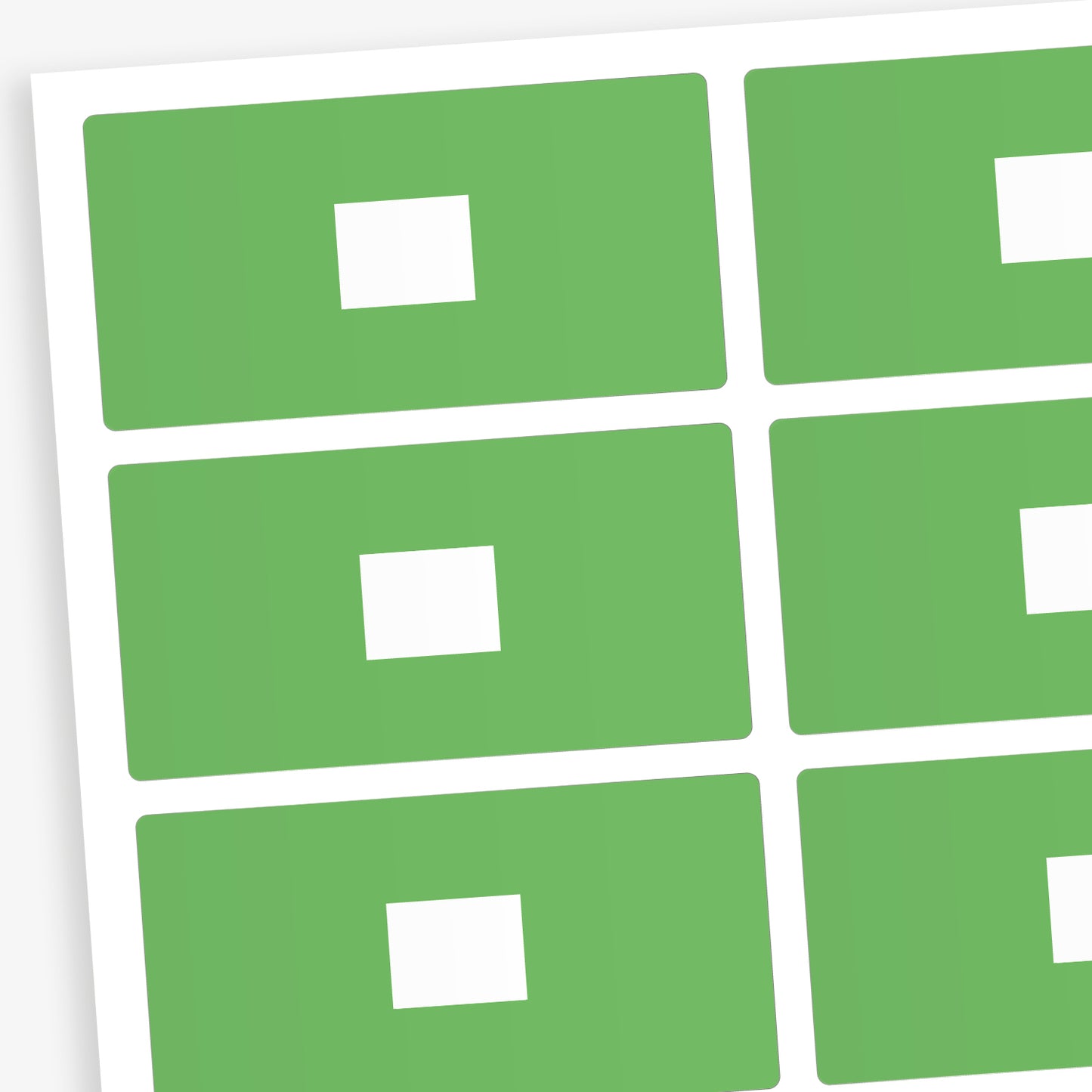 A set of 100 rectangular library labels, each measuring 72mm by 38mm, featuring a pastel green background with a white central panel for handwritten or printed text; designed to assist in categorising and organising books within educational settings