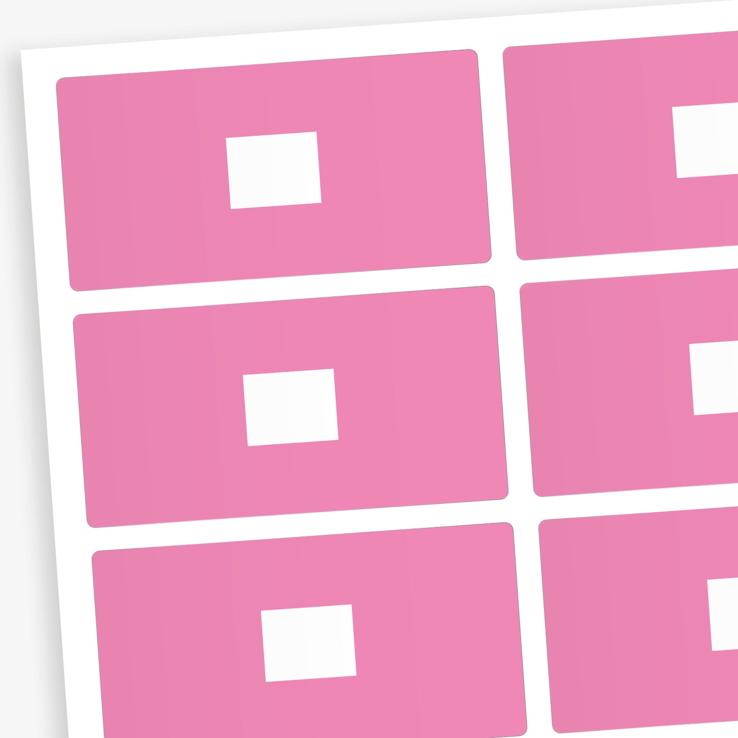 A set of 100 rectangular library labels, each measuring 72mm by 38mm, featuring a bold pink background with a white central panel for handwritten or printed text; designed to assist in categorising and organising books within educational settings