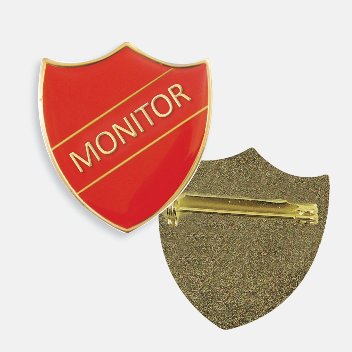 Red enamel badge in the shape of a shield with gold trim and diagonal gold line either side of the word 'MONITOR' in capital letters. The reverse side shows a textured gold back with a pin fastening