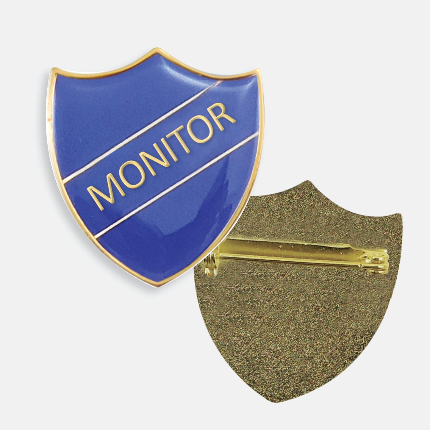Blue enamel badge in the shape of a shield with gold trim and diagonal gold line either side of the word 'MONITOR' in capital letters. The reverse side shows a textured gold back with a pin fastening