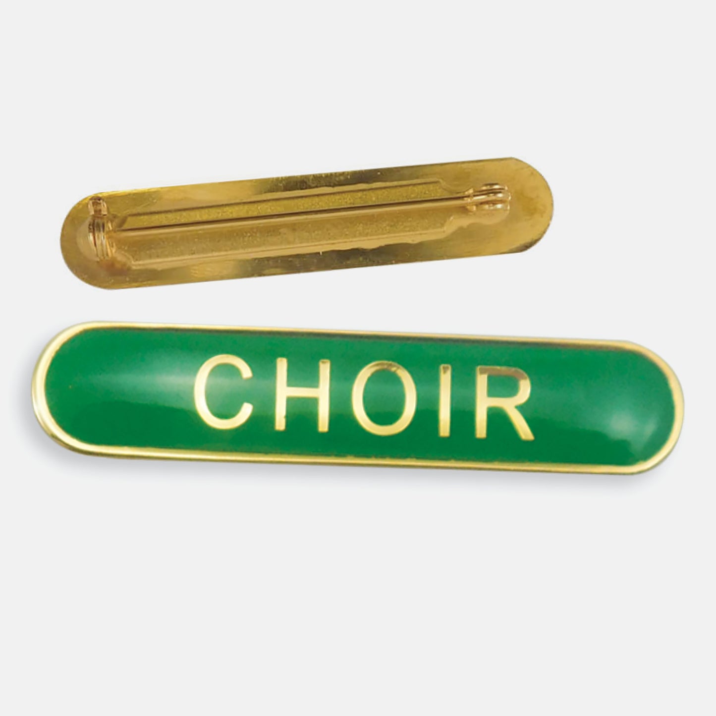 Green enamel badge in a long oval shape with the word 'CHOIR' central in gold capital letters. The reverse side shows a gold back with a pin fastening