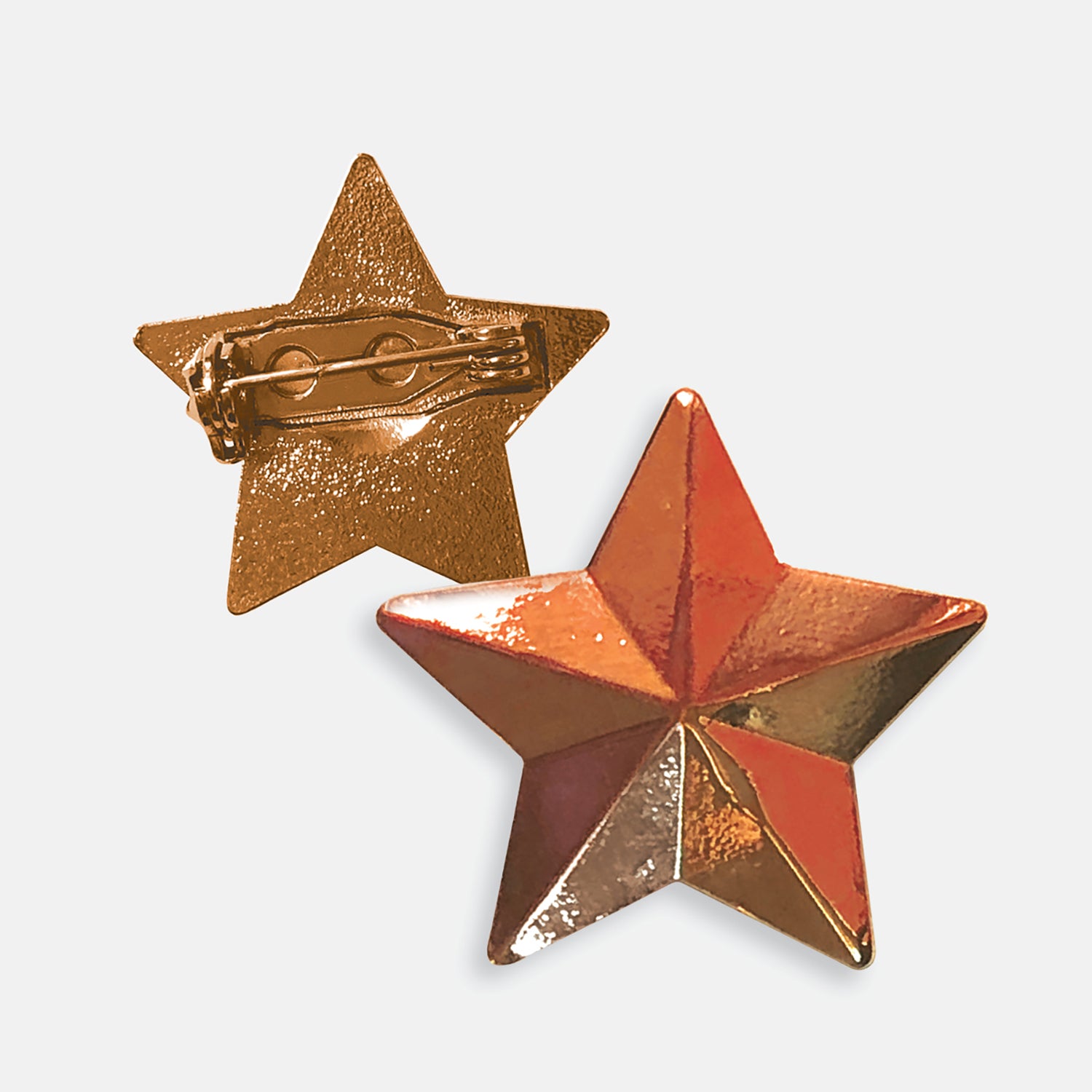 Bronze-coloured pin badge in the shape of a 3D star, with one badge showing the front and another showing the back with a pin fastening.