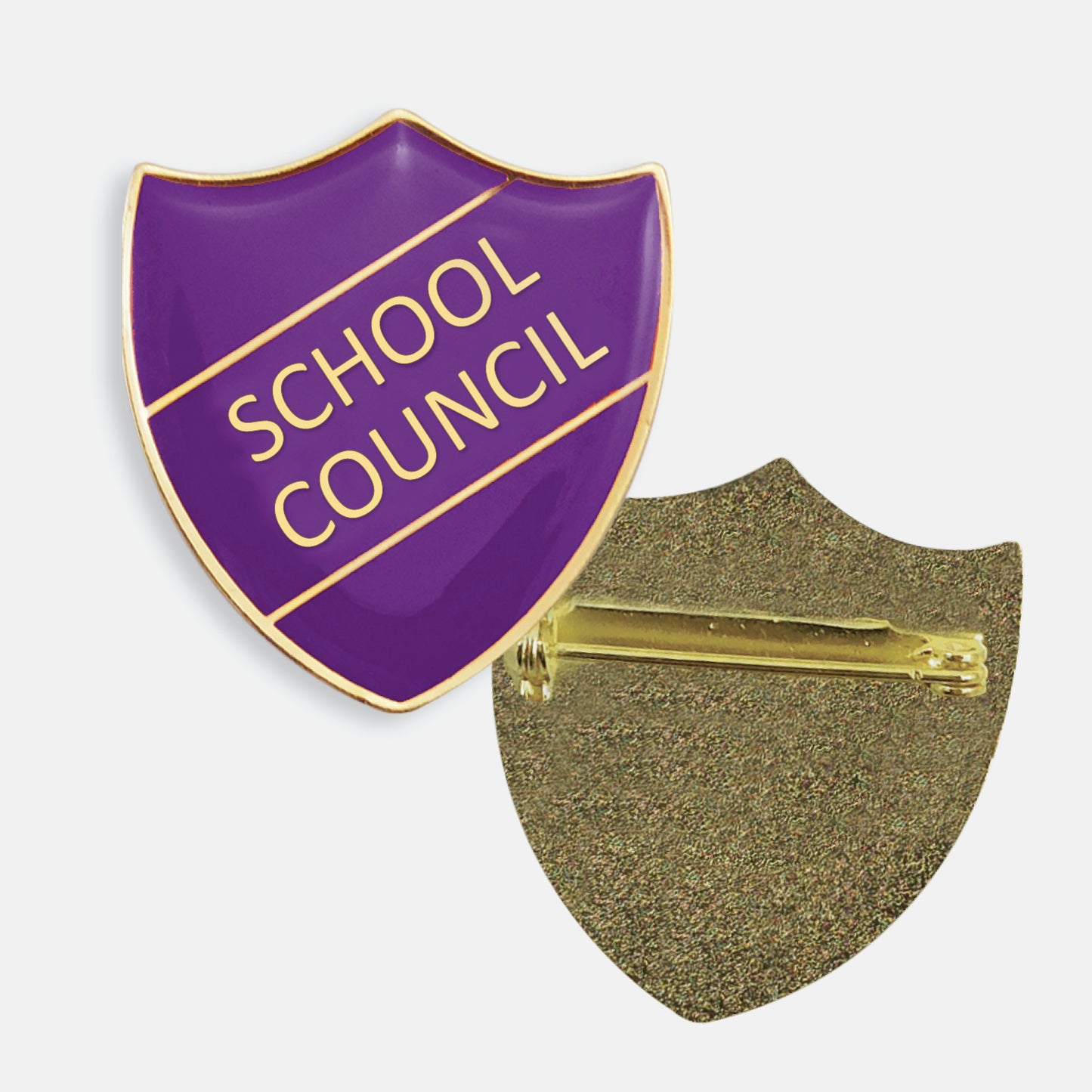 Green enamel badge in the shape of a shield with gold trim and diagonal gold line either side of the words 'SCHOOL COUNCIL' in capital letters. The reverse side shows a textured gold back with a butterfly fastening