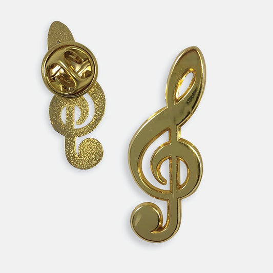Gold-coloured pin badge in the shape of a treble clef, with one badge showing the front and another showing the back with a butterfly pin fastening.