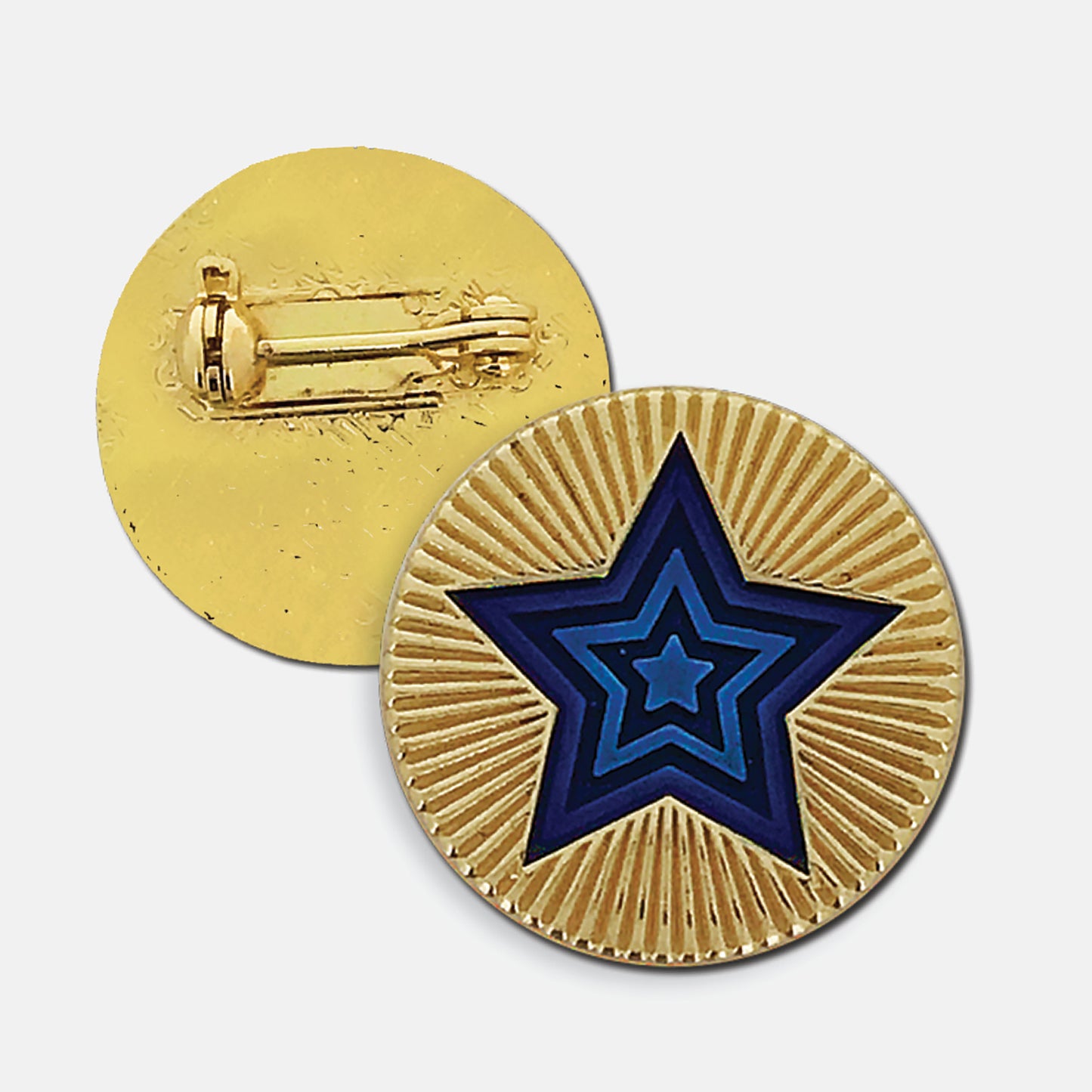 Gold enamel round badge with a radiating blue star in the centre, the gold enamel surrounding the star is engraved to depict a starburst. The reverse side shows a gold back with a pin fastening.