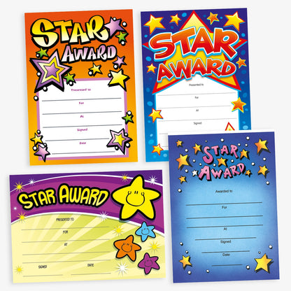 Assortment of A5 Star Award certificates in various vibrant designs, each featuring the bold title 'Star Award'. The certificates display colourful backgrounds with star motifs and include spaces for 'Presented to', 'For', 'At', 'Signed', and 'Date' entries, designed to celebrate and acknowledge pupil achievements.