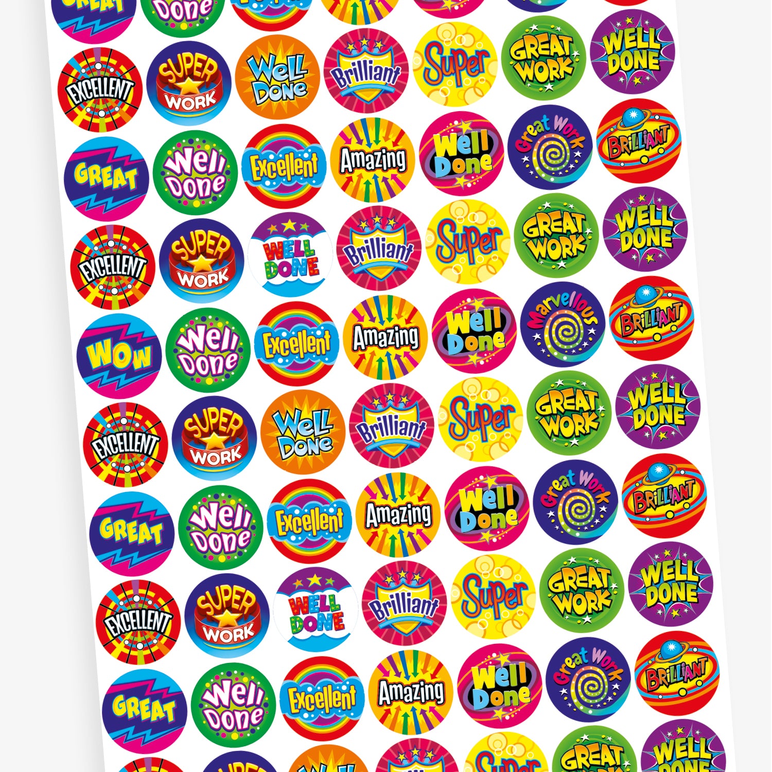 A sheet of vibrant circular reward stickers with motivational phrases such as 'Amazing', 'Great', 'Well Done', 'Excellent', 'Brilliant', and 'Great Work'. Each sticker features bold, colourful text with dynamic backgrounds in patterns like stars, bursts, and zigzags, designed to celebrate achievements and encourage positivity.