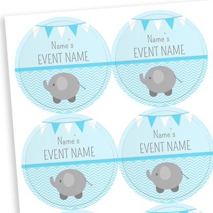 Sheet of round pale blue stickers with a line halfway down the sticker.  The bottom half shows a grey elephant against a wavy background.  Above the line placeholder text reading 'Name's    EVENT NAME' with two tone bunting at the top of the sticker.  Ideal for customisation for baby showers.