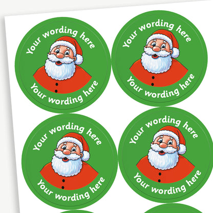 A sheet of green stickers featuring Father Christmas in the centre.  Placeholder text 'Your wording here' is above and below the image for customisation.