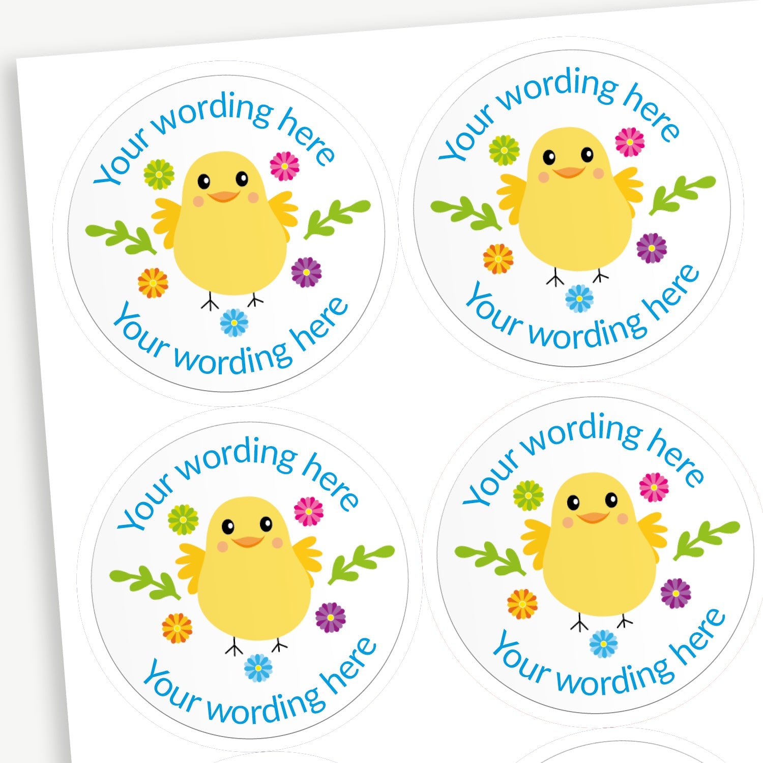 Sheet of round personalised stickers featuring a yellow chick and flowers on a white background; includes customisable blue text above and below the image for customisation.
