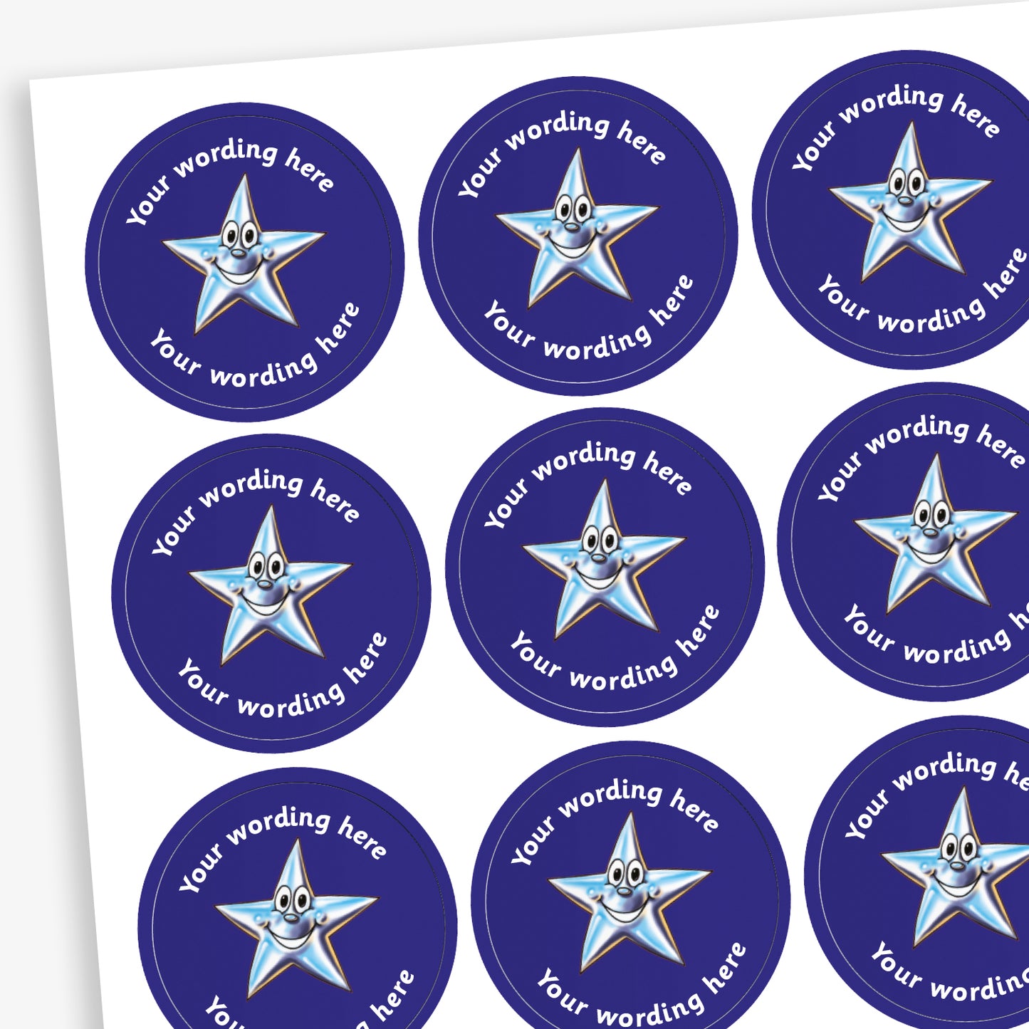 A sheet of circular, dark blue reward stickers featuring a cartoon silver, smiling star as a central image. Placeholder text above and below 'Your wording here' indicate customisation options.