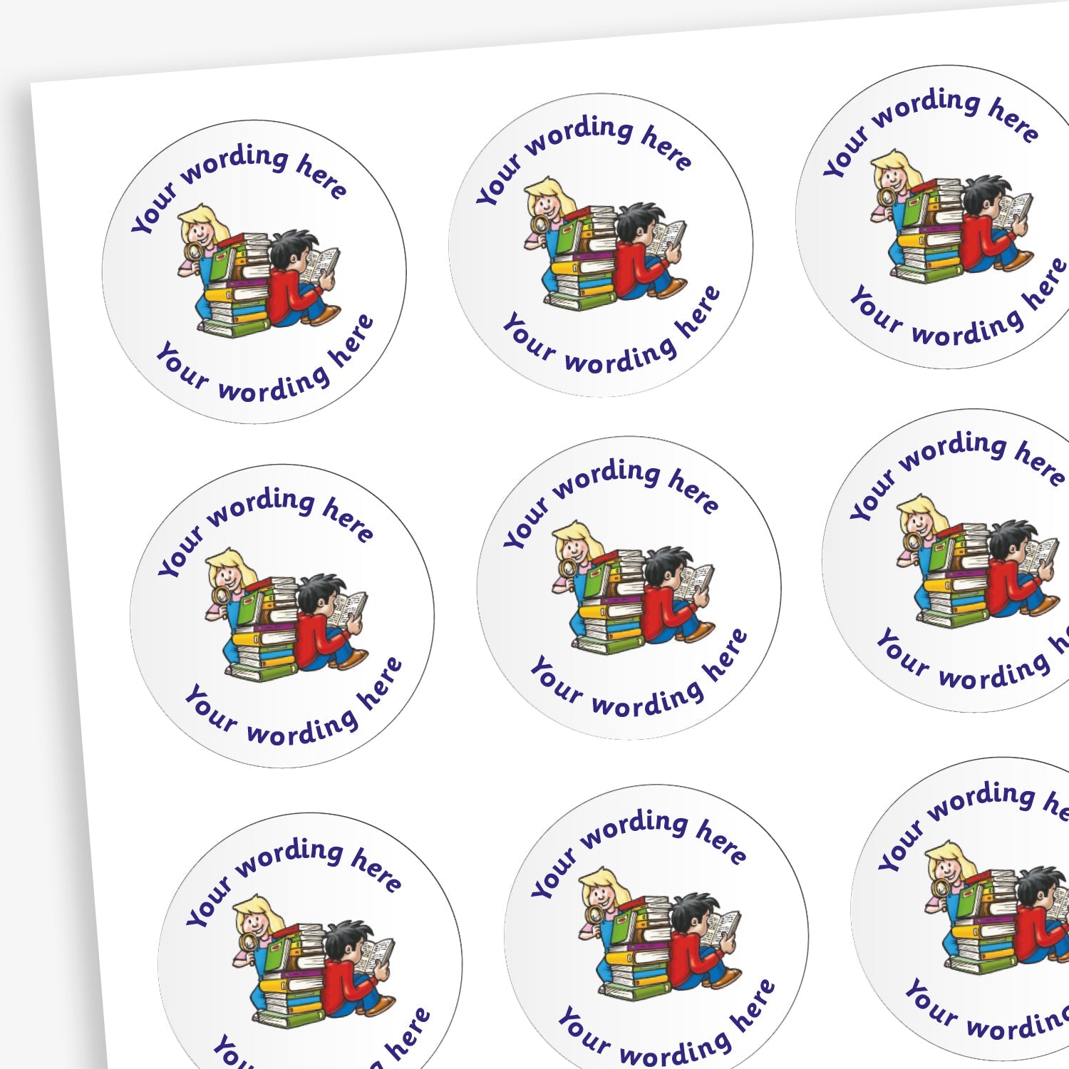 A sheet of circular reward stickers featuring a white background with two children reading against a pile of books in the centre. Each sticker includes the placeholder text 'Your wording here' curved along the top and bottom edges, indicating customisable space for personalised messages