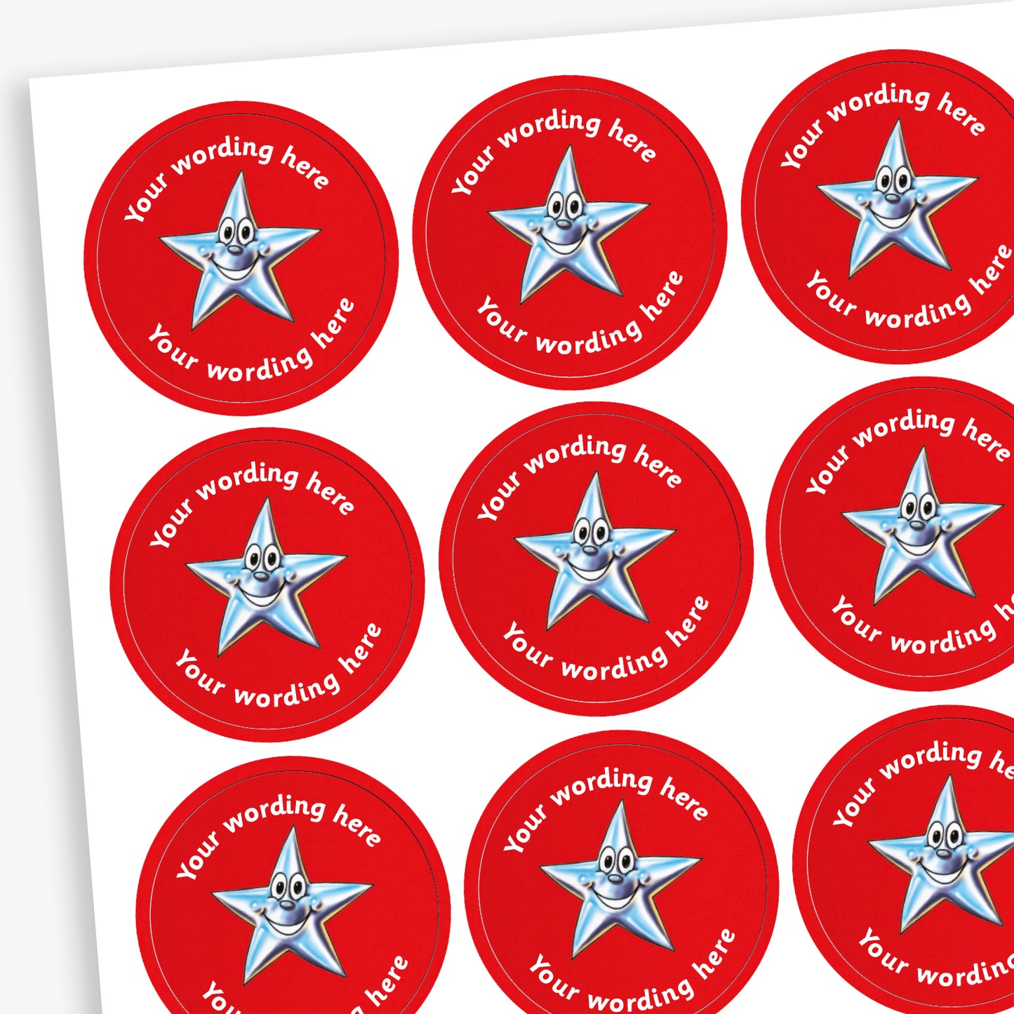 A sheet of circular, red reward stickers featuring a cartoon silver, smiling star as a central image. Placeholder text above and below 'Your wording here' indicate customisation options.