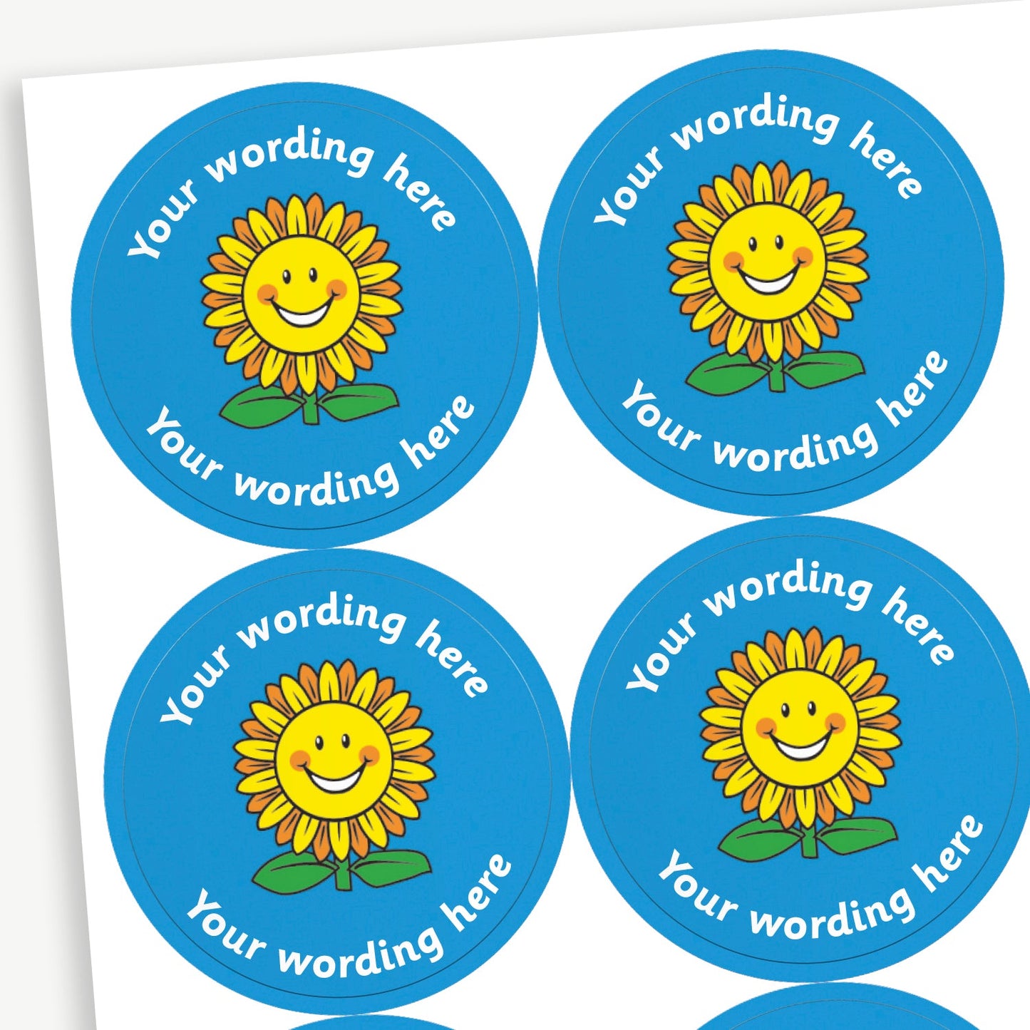A sheet of blue stickers featuring a sunflower in the centre.  Placeholder text 'Your wording here' is above and below the image for customisation.