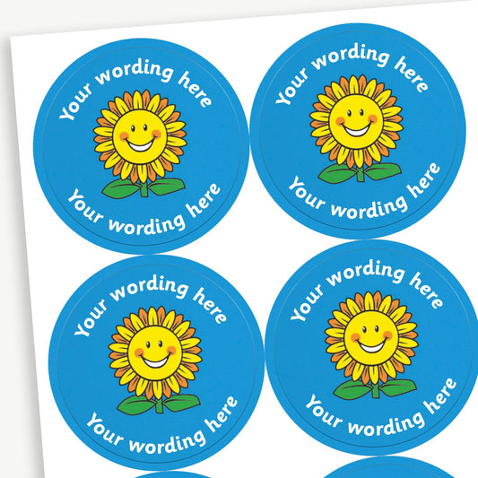A sheet of blue stickers featuring a sunflower in the centre.  Placeholder text 'Your wording here' is above and below the image for customisation.