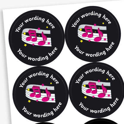 Circular reward stickers with a black background featuring pink musical notes on a music staff. Yellow and pink stars are scattered throughout the design. Each sticker includes placeholder text 'Your wording here' curved along the top edge for customisation.