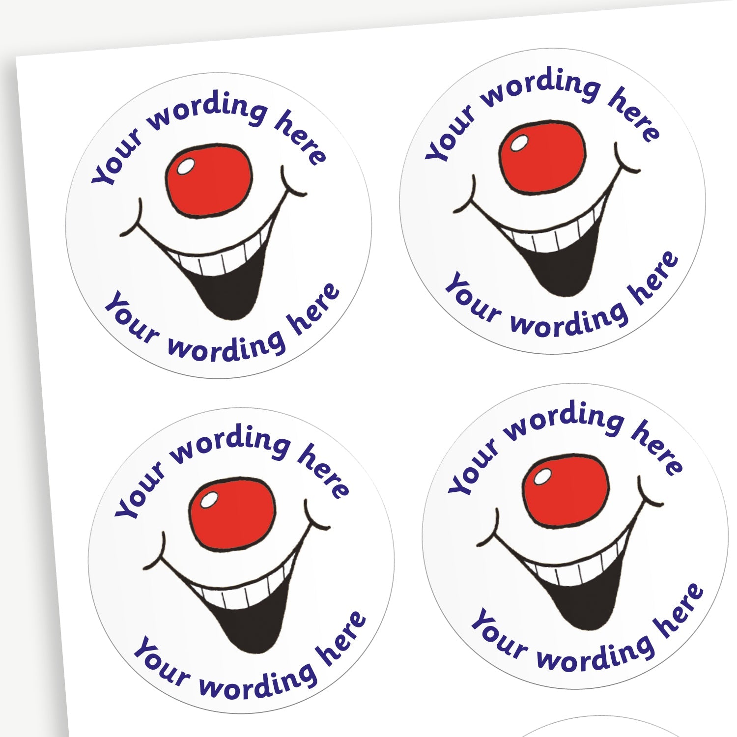 A sheet of white stickers featuring a red nose and laughing mouth.  Placeholder text 'Your wording here' is above and below the image.