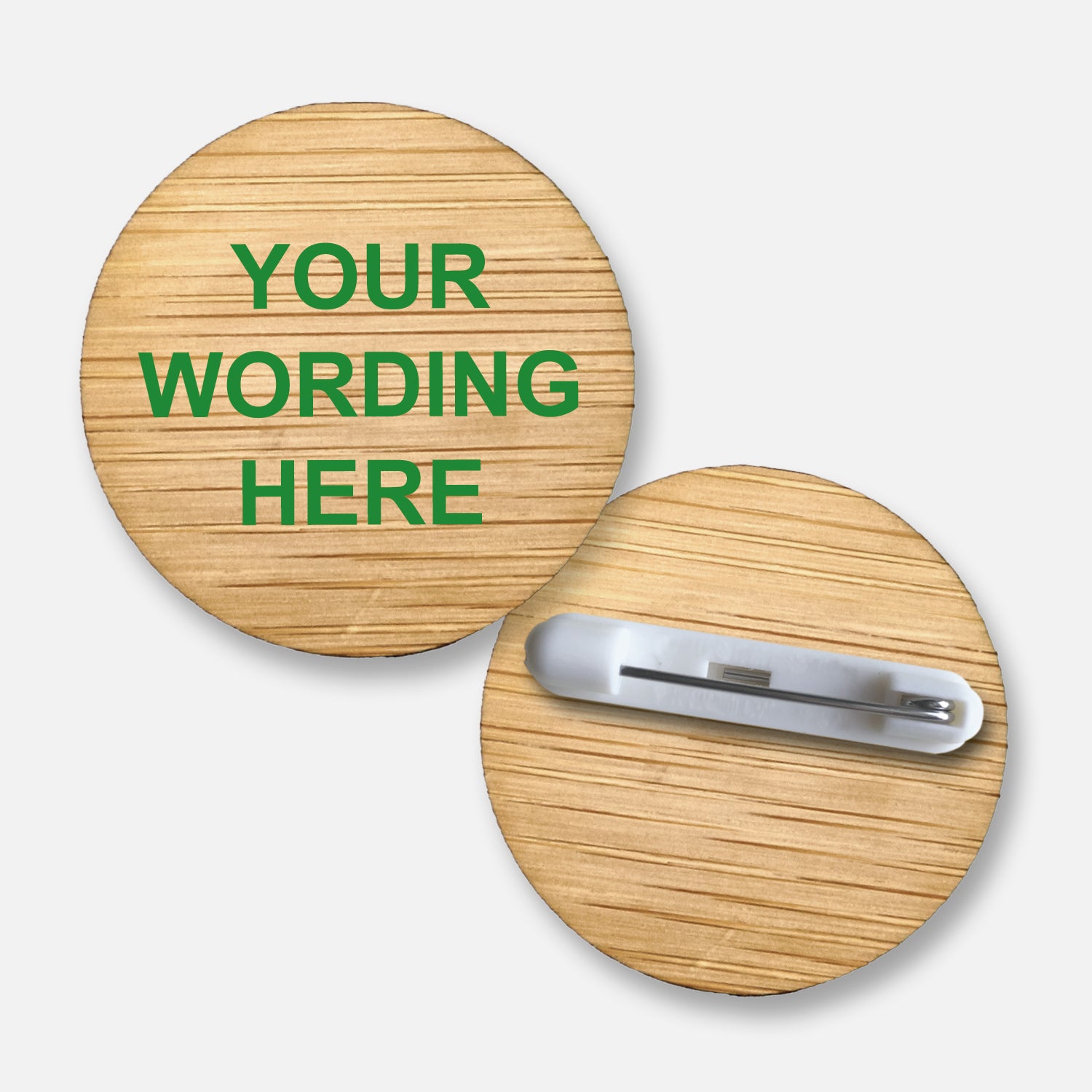 A 38mm circular badge crafted from natural bamboo coloured purple, featuring the placeholder text 'Your Wording Here' in yellow capital letters on the front, with a pin fastening on the reverse side.