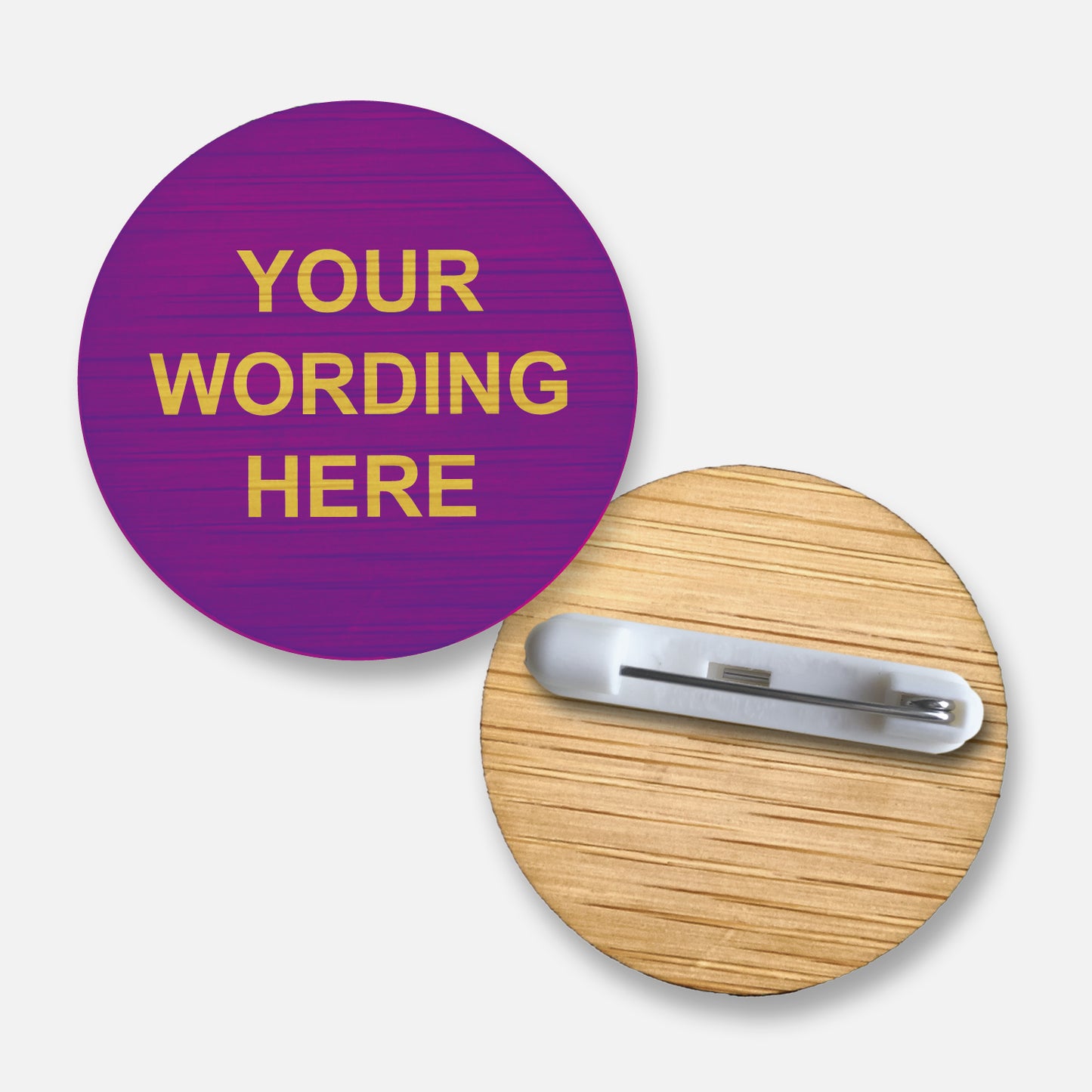 A 38mm circular badge crafted from natural bamboo, featuring the placeholder text 'Your Wording Here' in green capital letters on the front, with a pin fastening on the reverse side.