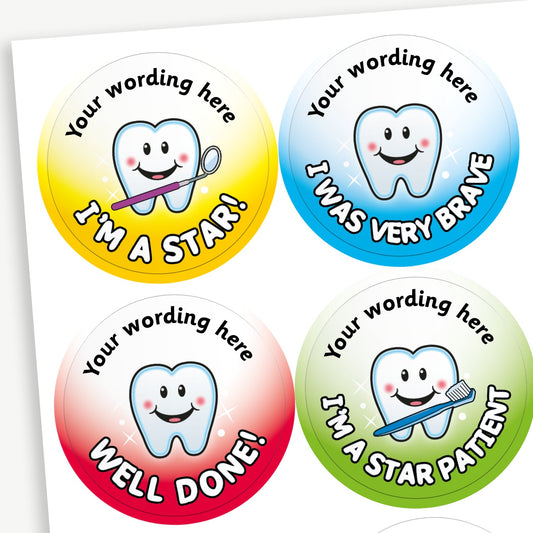 Four colourful circular dental reward stickers featuring smiling cartoon teeth. Top left: Yellow sticker with the text 'I'm a Star!'. Top right: Blue sticker with 'I Was Very Brave'. Bottom left: Red sticker with 'Well Done!'. Bottom right: Green sticker with 'I'm a Star Patient'. Each sticker includes placeholder text at the top reading 'Your wording here' for customisation,