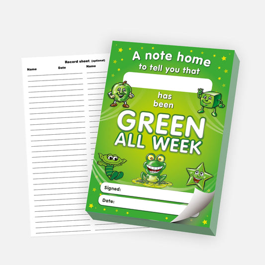 'A note home to tell you that [blank] has been GREEN ALL WEEK' reward pad with a bright green background and cheerful cartoon characters including a frog, star, and other green-themed figures. The note includes spaces for a signature and date. A detachable record sheet for tracking names and dates is shown beside the pad.