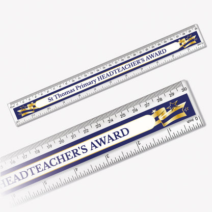 30cm plastic ruler with a black background, decorated with a gold and black banner with space in the centre for custom wording in bold text.