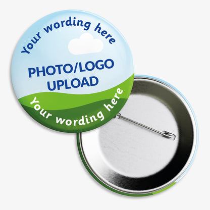 Circular badge with a sky-blue and green design, featuring placeholder text 'Your wording here' at the top and bottom. The centre displays a sample image area labelled 'PHOTO/LOGO UPLOAD', indicating customisable space for a personal image or logo. The badge is accompanied by a rear view showing a metal pin fastening.