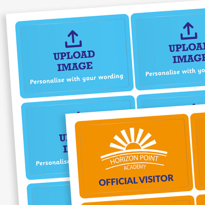 A sheet of customisable rectangular stickers. Most are blue with placeholder text that reads 'UPLOAD IMAGE' and 'Personalise with your wording'. One orange sticker in the foreground is completed with the logo and name 'Horizon Point Academy' and the label 'OFFICIAL VISITOR' in white text. These stickers are intended for custom school or event use.