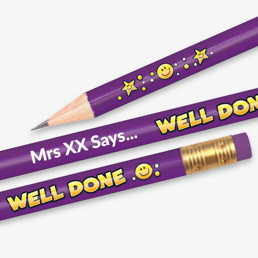 Personalised purple HB pencil with customisable text on the barrel with the phrase 'WELL DONE' closest to the eraser with stars and smiling faces.  Designed for classroom rewards or promotional use.